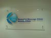 Suspended wall sign